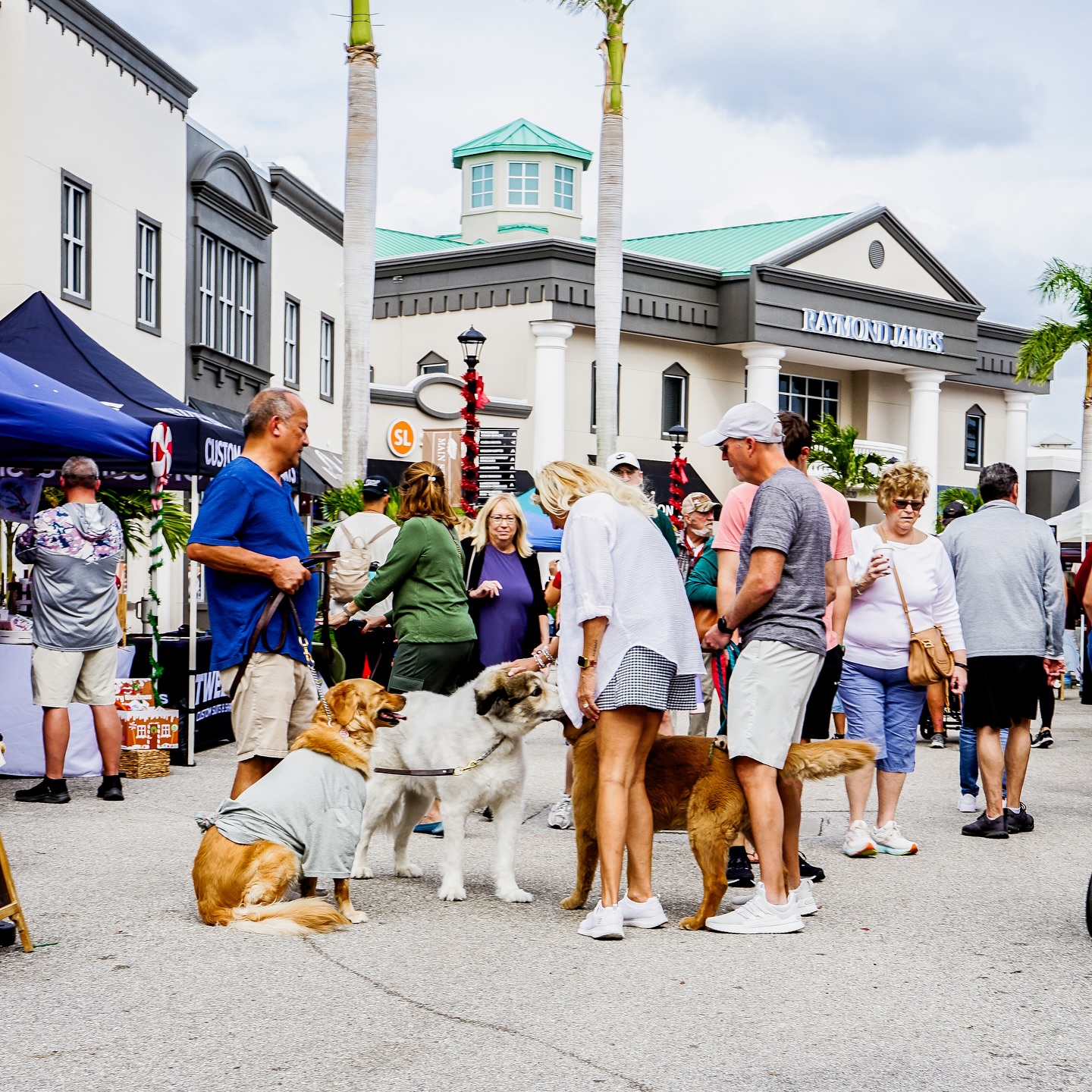 People walking through an outdoor market
