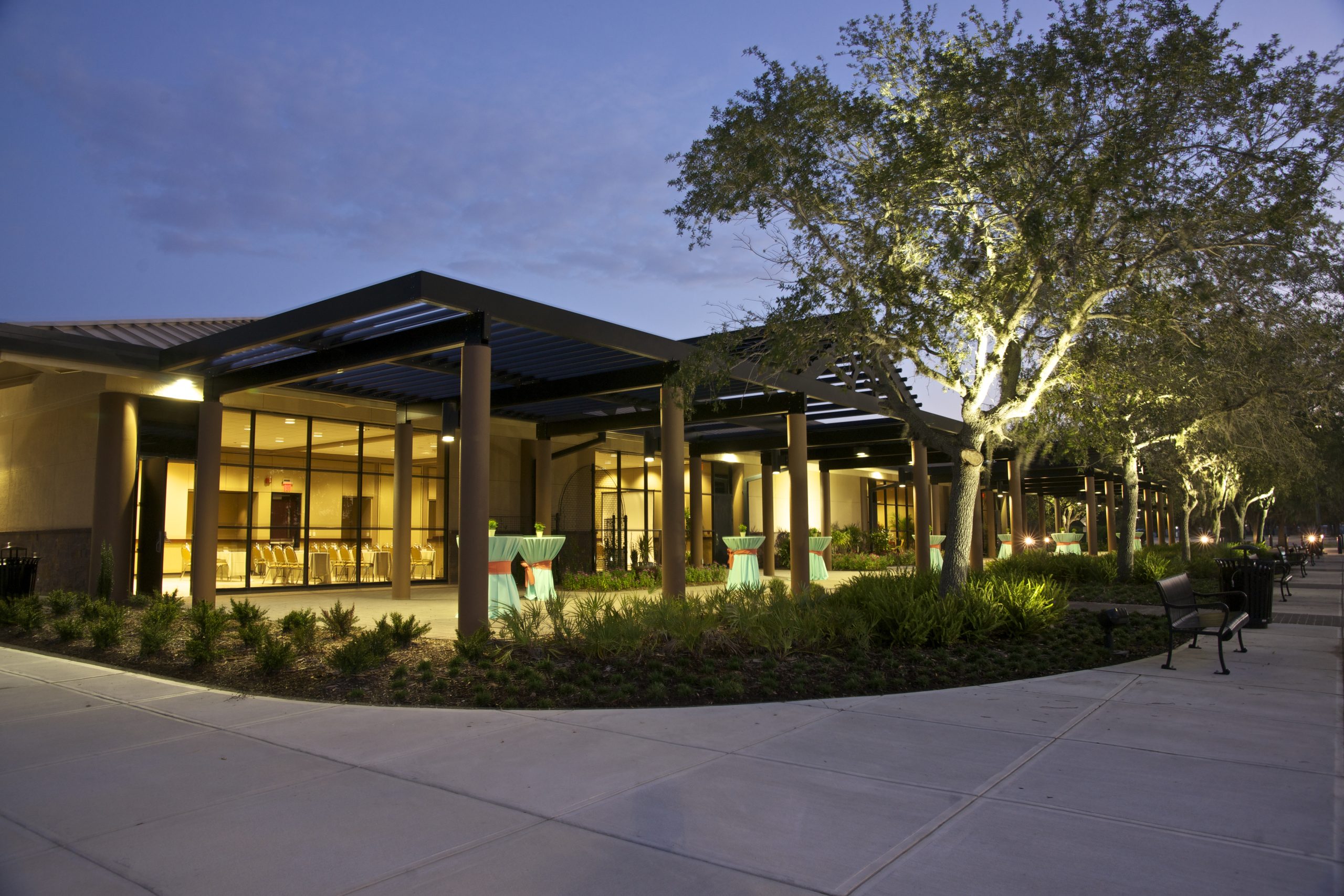Convention Center Neatly decorated high top tables are scattered under a patio cover just outside of one of the meeting rooms available in the Bradenton Area Convention Center in Florida's Gulf Coast, creating space for learning and networking.