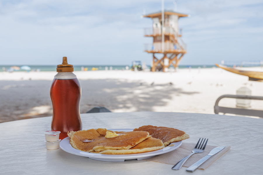 Family Adventures: Memories Made on the Gulf pancakes with a view of the beach and a lifeguard tower