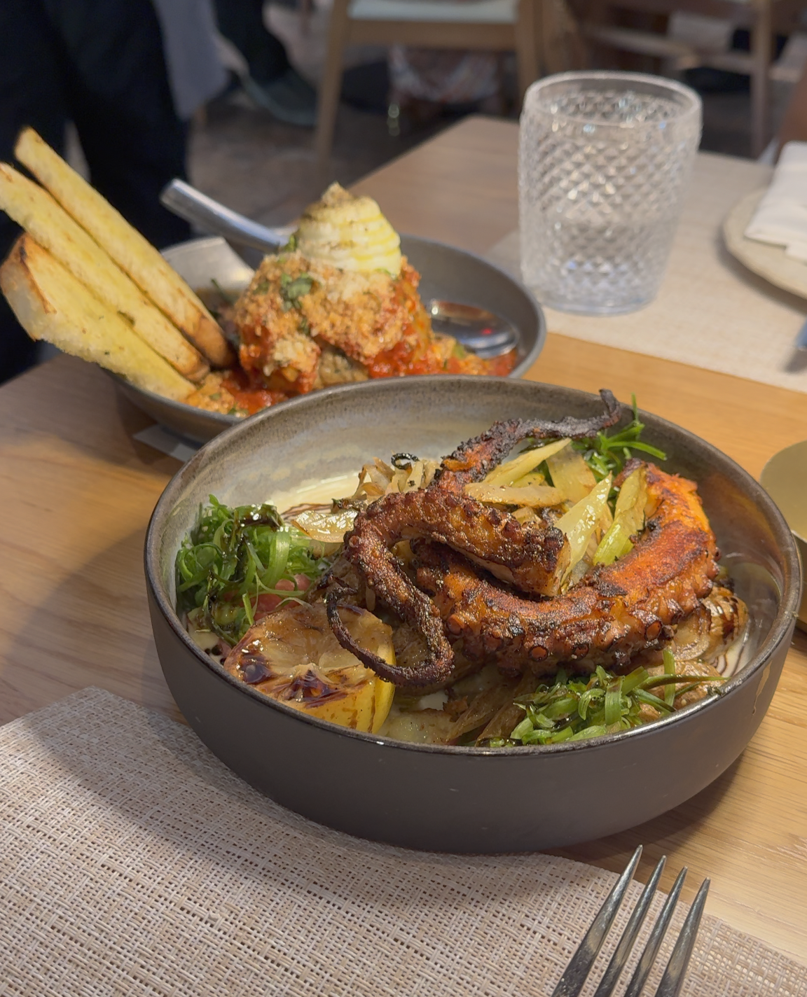 Couples Getaway grilled octopus and a meatball dish from taverna toscana