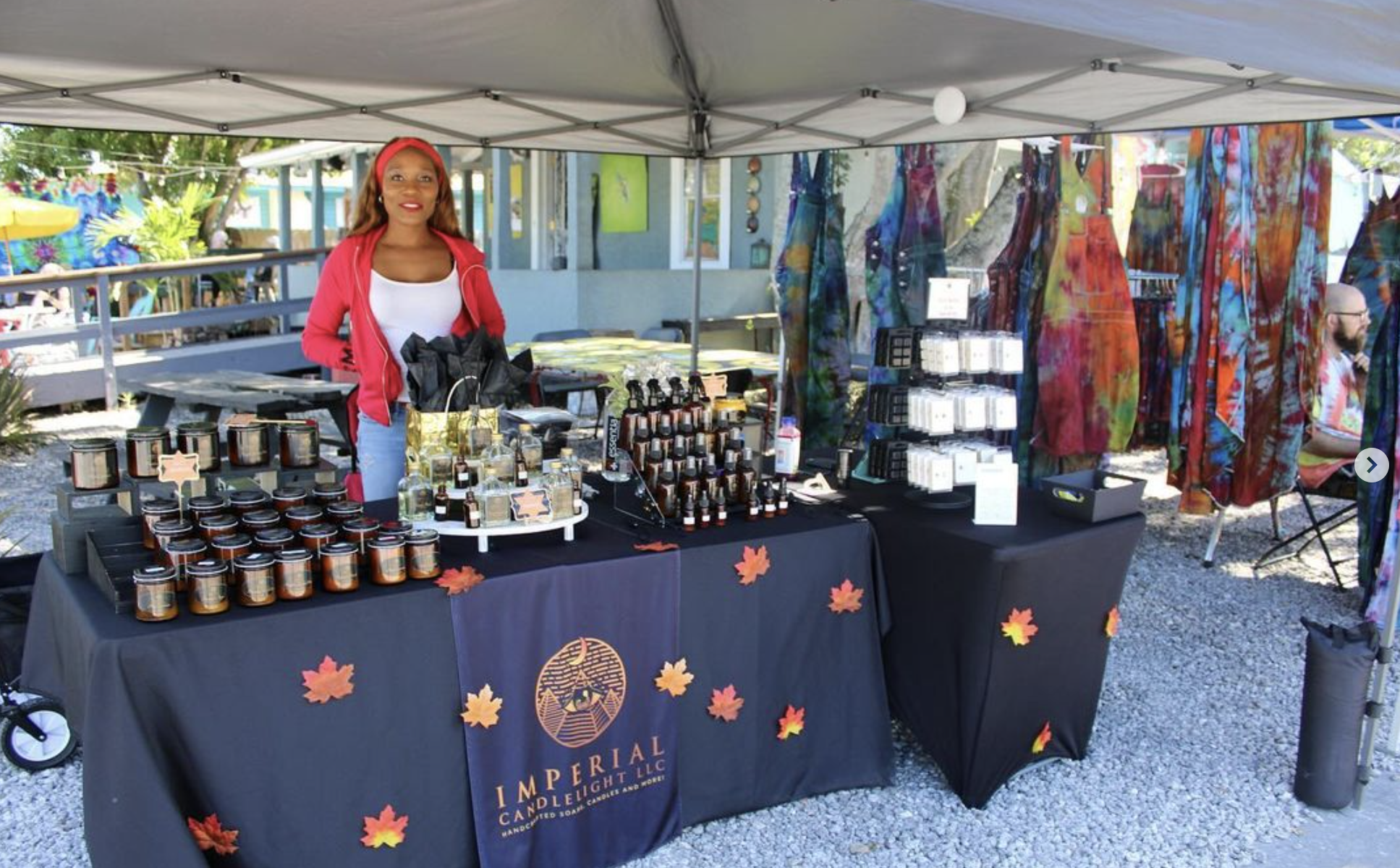 woman vending candles at the 13th & 13th art market
